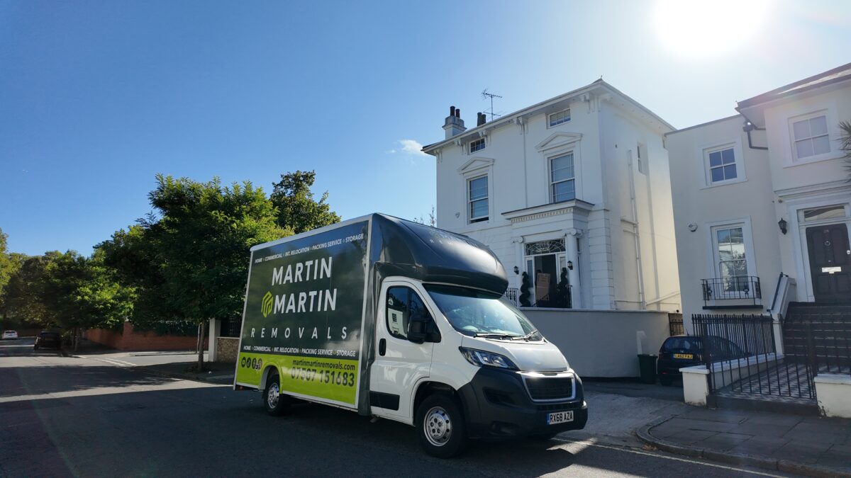 Martin & Martin Removals van outside a large Essex home providing a full house moving service