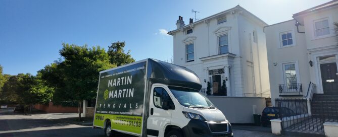 Martin & Martin Removals van outside a large Essex home providing a full house moving service